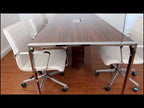 Apple Side U vergadertafel met open poten en stroomvoorzieningssysteem.